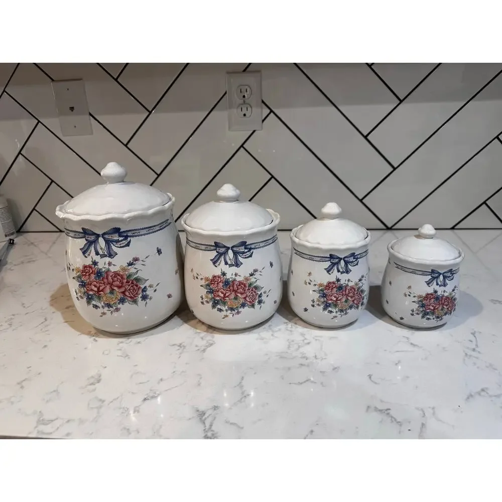 four ceramic kitchen canisters floral bouquet blue ribbon bow 90s cotton prairie